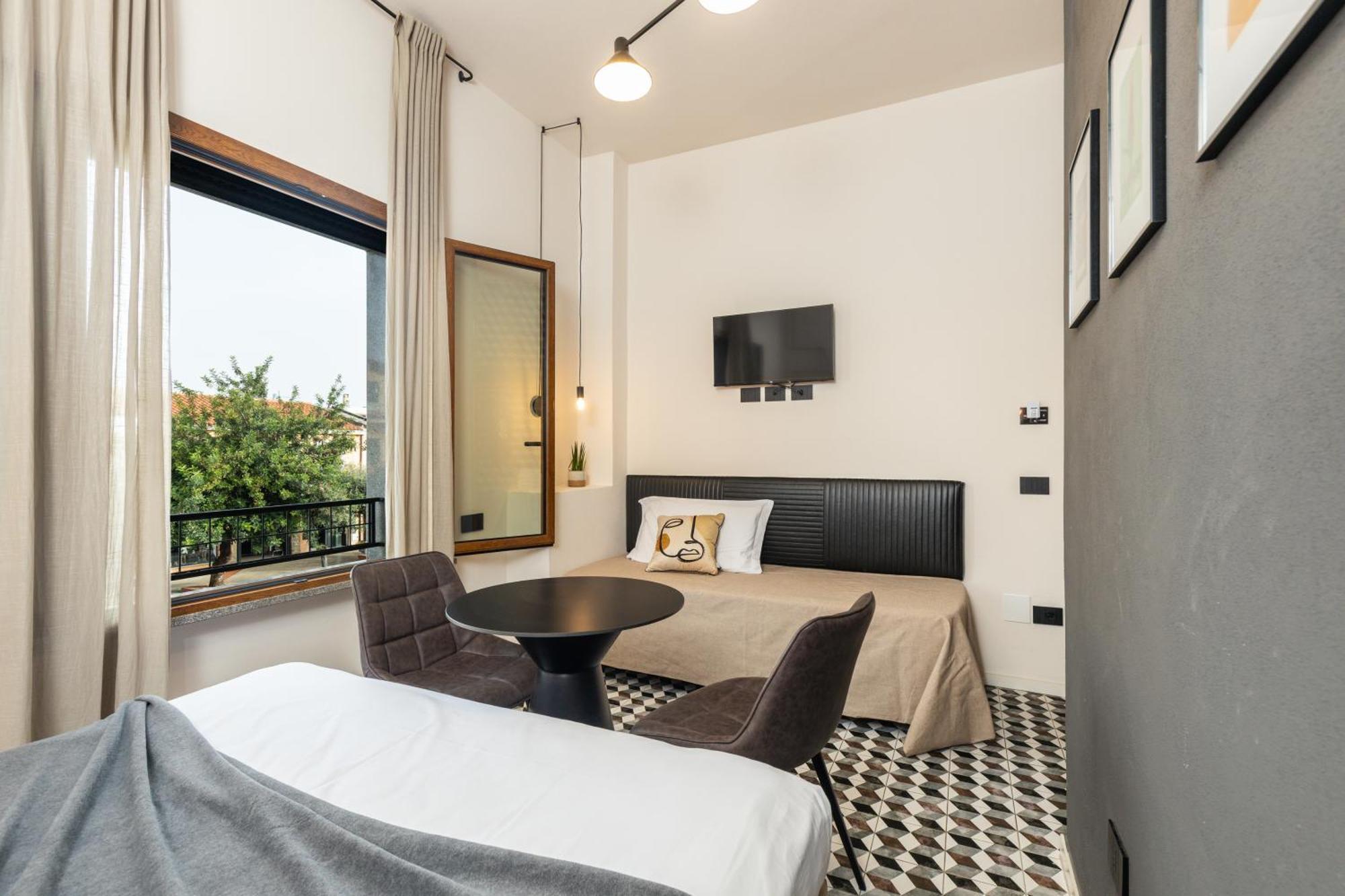 Iknos Accommodation Тортоли Экстерьер фото